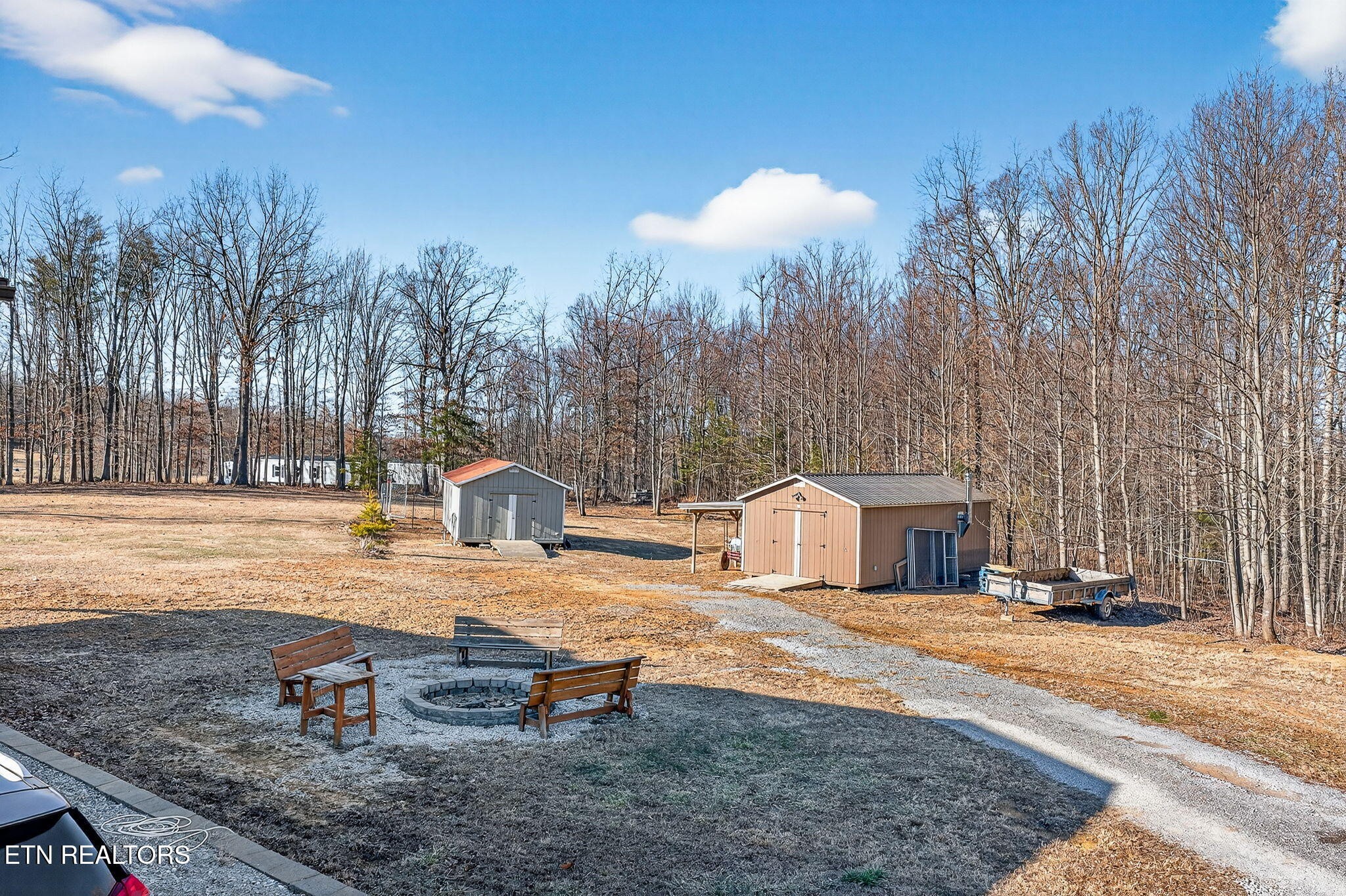 3773 Glade Creek Road Sparta, TN 38583 - Photo 40 of 59 a view of a swimming pool with an outdoor space and seating area