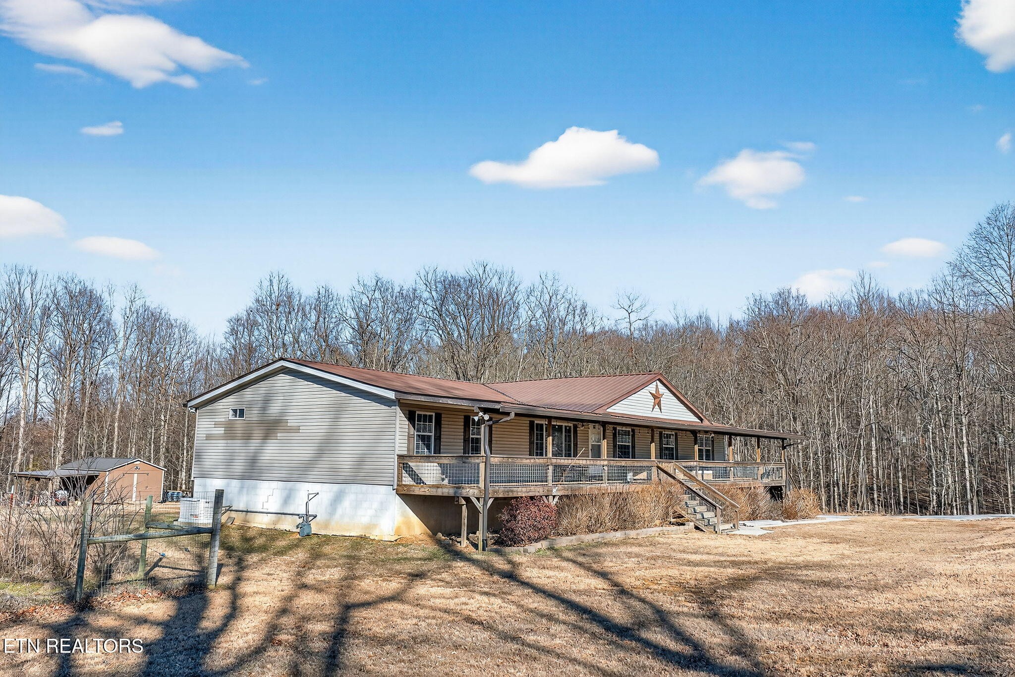 3773 Glade Creek Road Sparta, TN 38583 - Photo 44 of 59 a house with trees in the background
