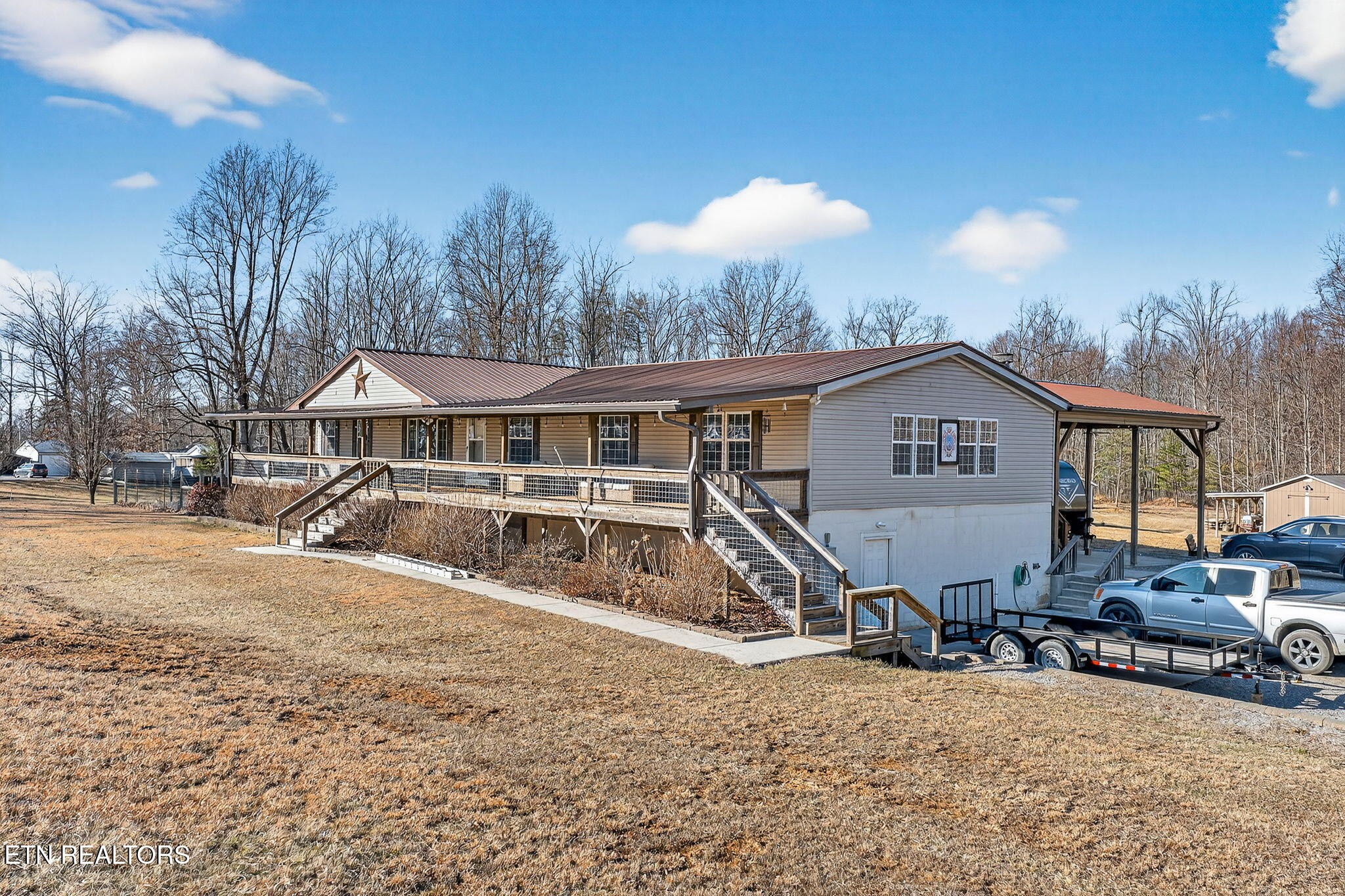 3773 Glade Creek Road Sparta, TN 38583 - Photo 51 of 59 a view of a house with backyard and sitting area
