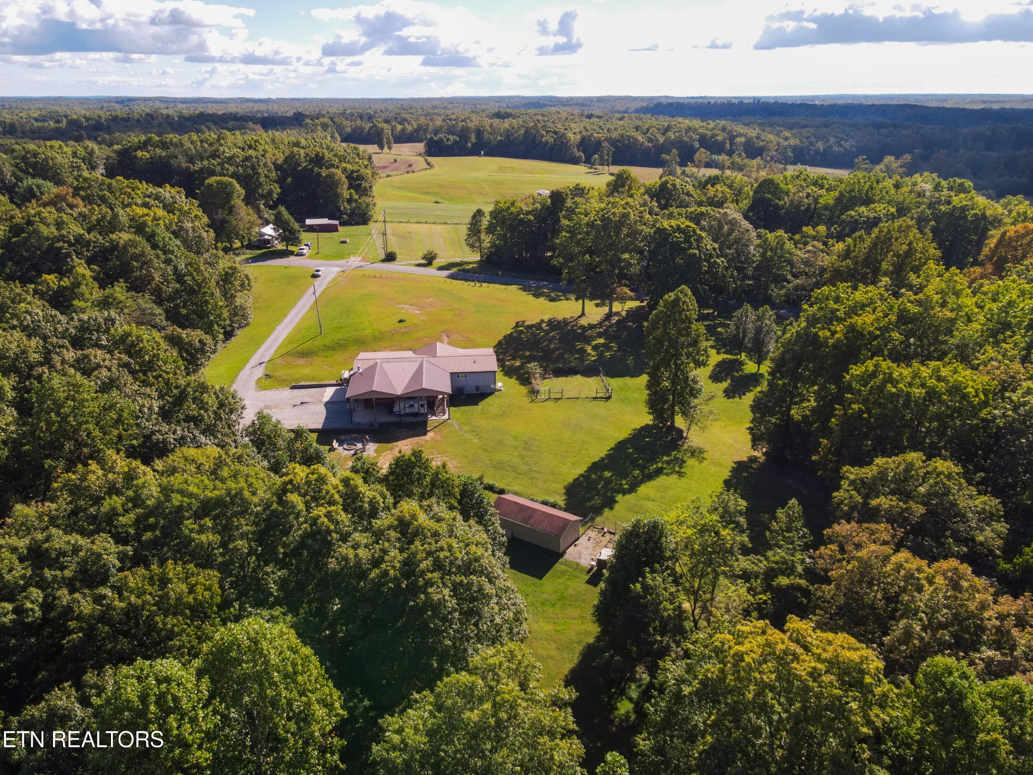 3773 Glade Creek Road Sparta, TN 38583 - Photo 53 of 59 a view of a swimming pool and outdoor seating