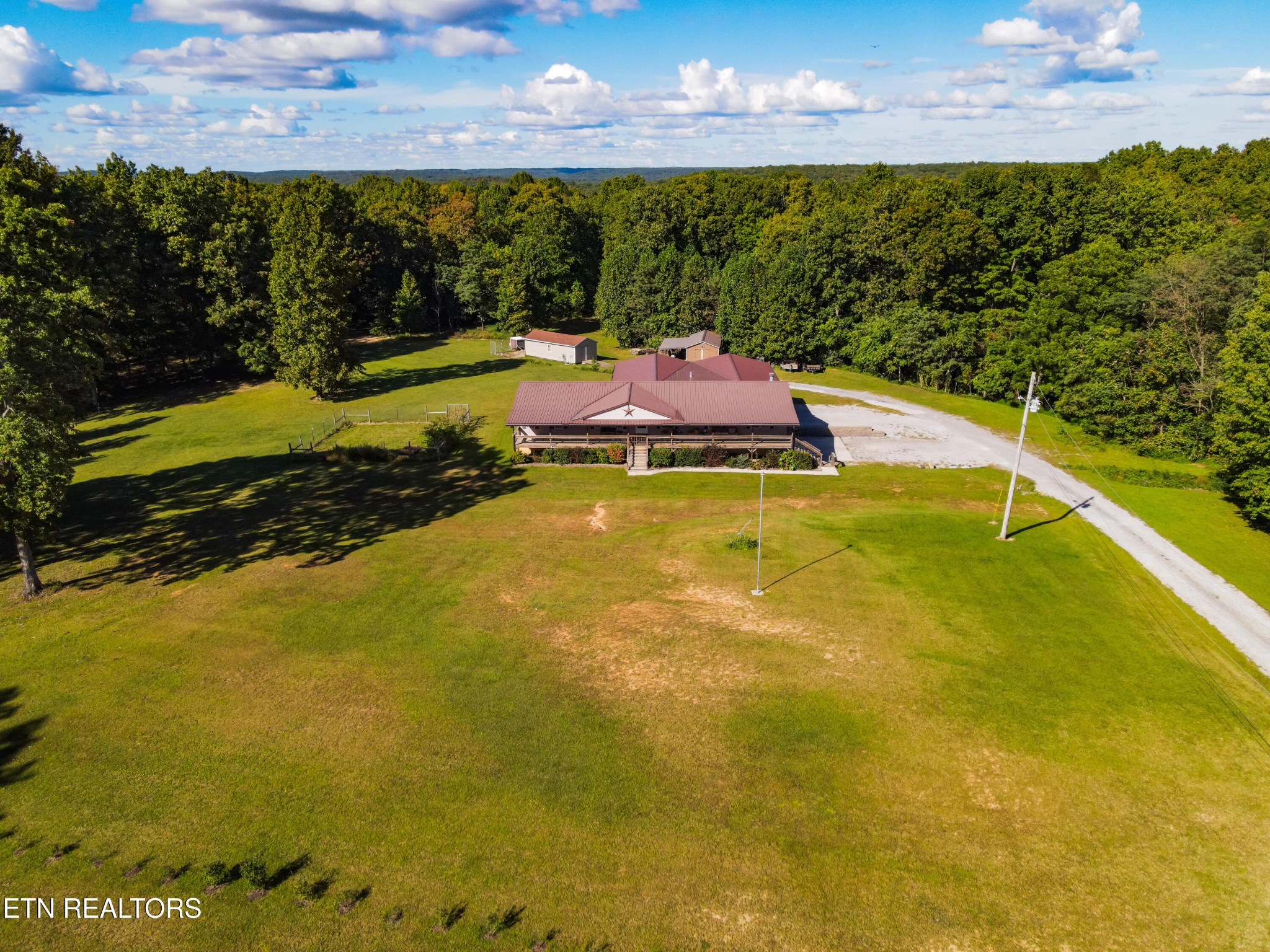 3773 Glade Creek Road Sparta, TN 38583 - Photo 54 of 59 a view of a swimming pool with an outdoor seating a yard in back