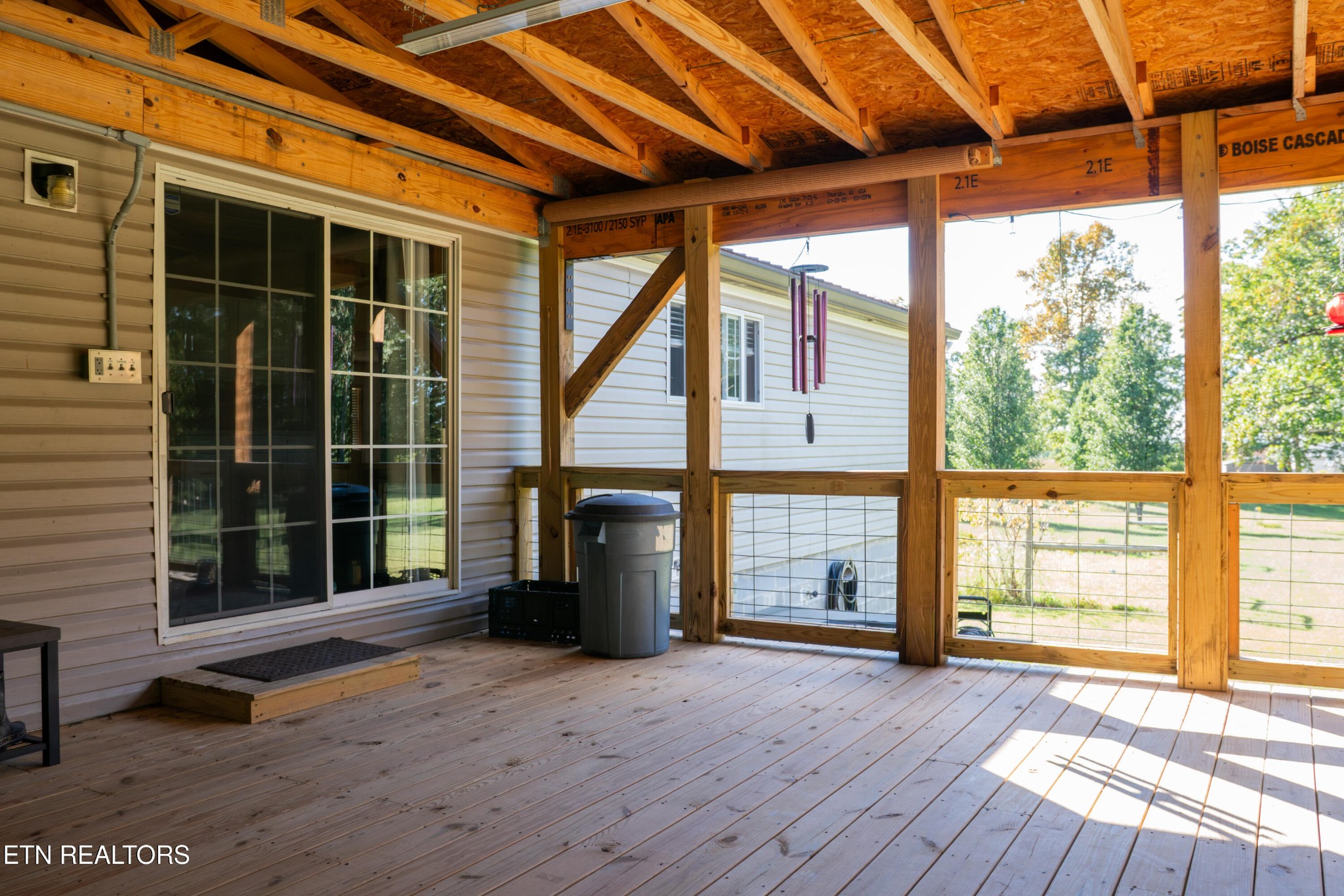 3773 Glade Creek Road Sparta, TN 38583 - Photo 55 of 59 a view of an empty room with a window and wooden floor