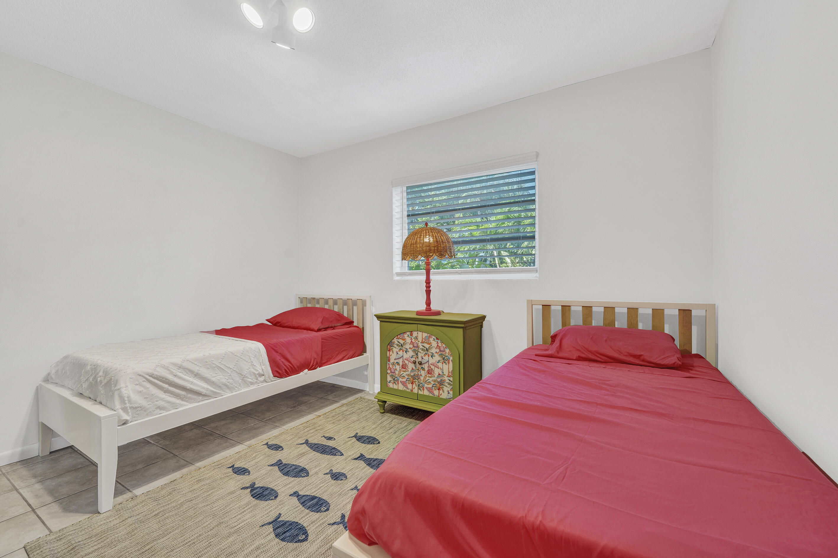 1129 Pebble Beach Lane, Unit 6 Marathon, FL 33050 - Photo 12 of 31 a bedroom with a bed and balcony