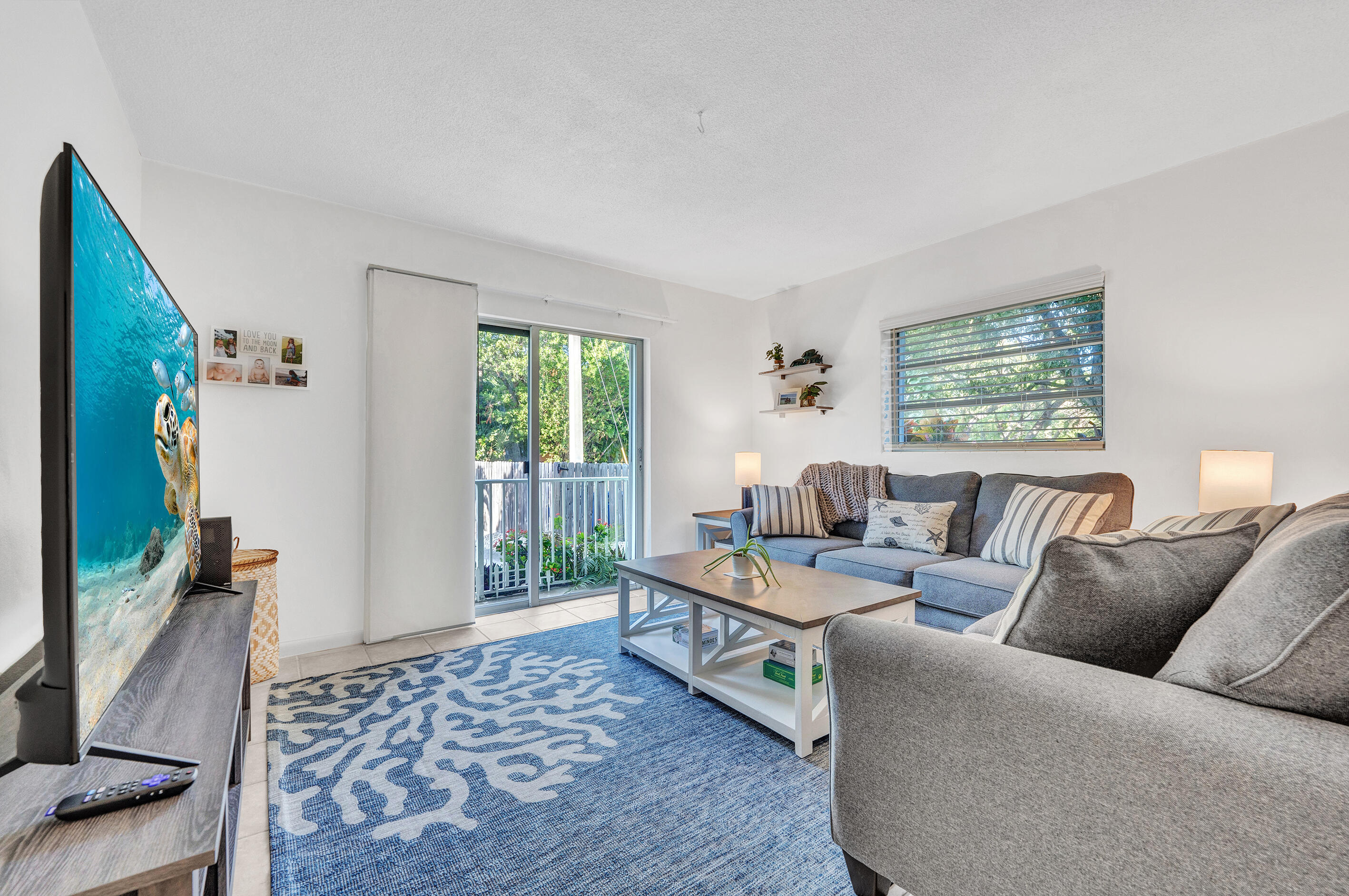 1129 Pebble Beach Lane, Unit 6 Marathon, FL 33050 - Photo 2 of 31 a living room with furniture and a window