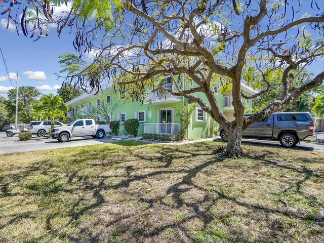 a car parked in front of a house
