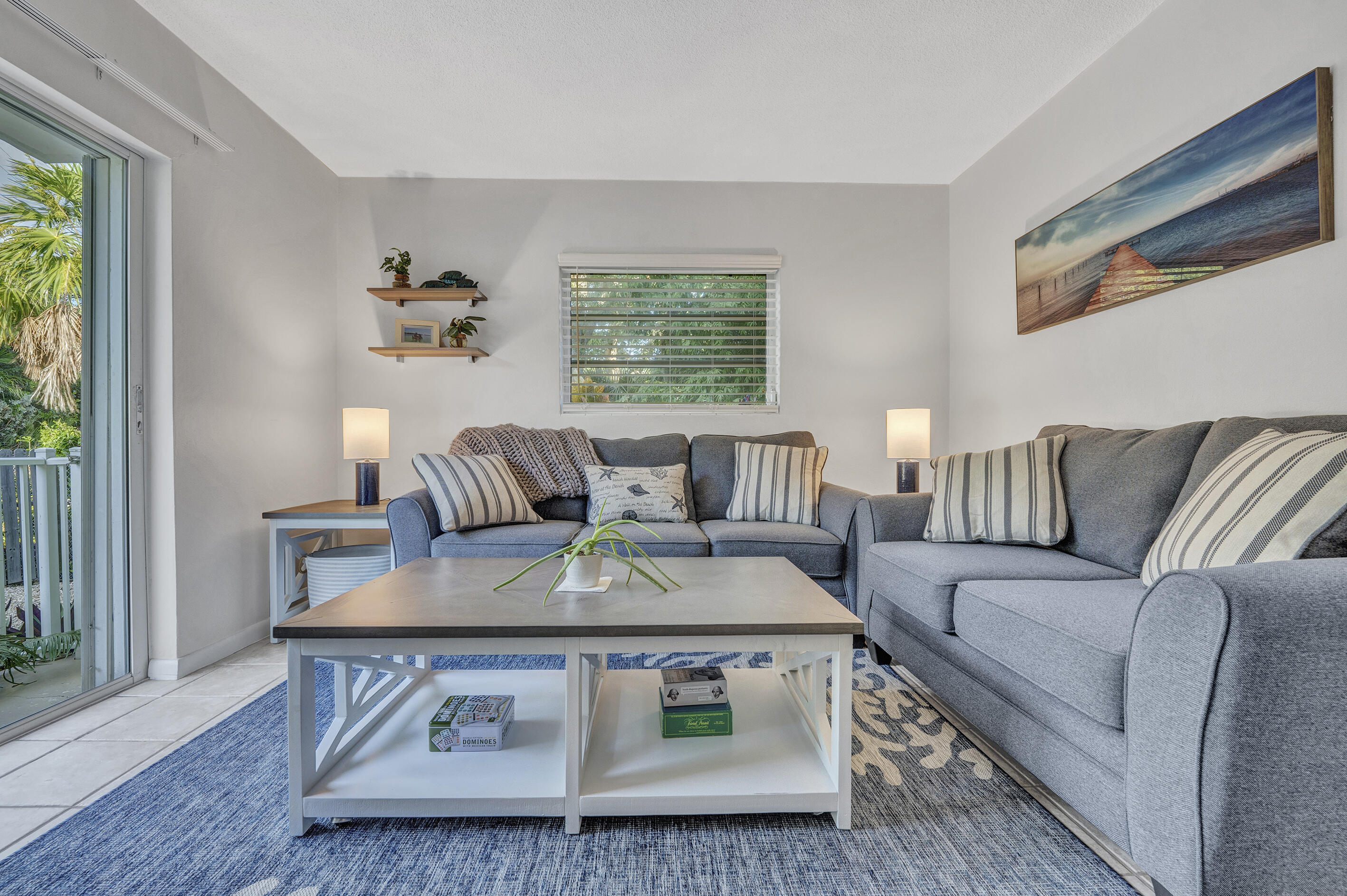 1129 Pebble Beach Lane, Unit 6 Marathon, FL 33050 - Photo 4 of 31 a living room with furniture and a window