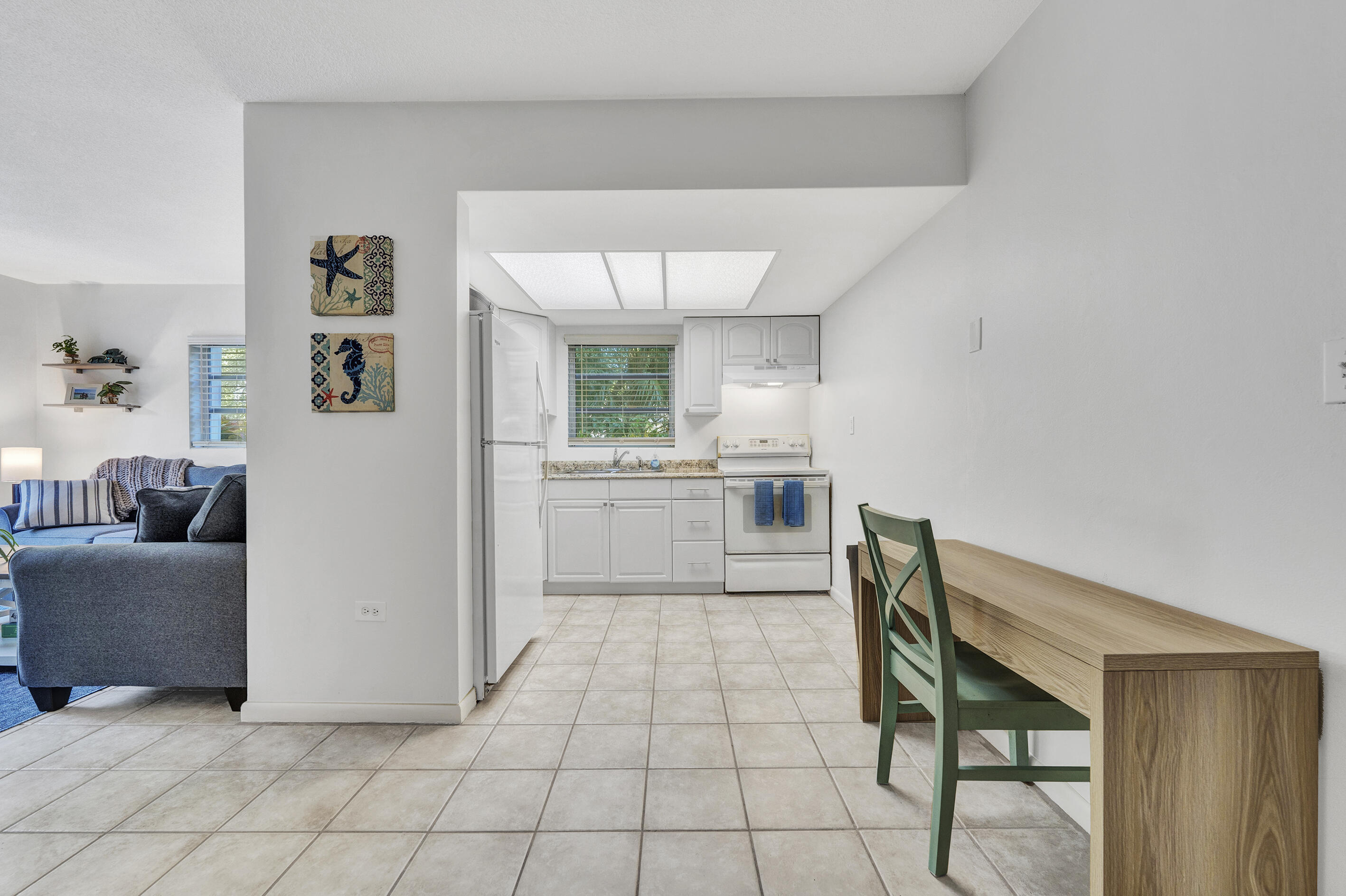 1129 Pebble Beach Lane, Unit 6 Marathon, FL 33050 - Photo 6 of 31 a kitchen with a cabinets and counter space