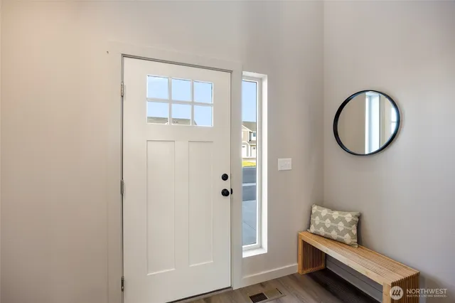 a view of room with a mirror and a window