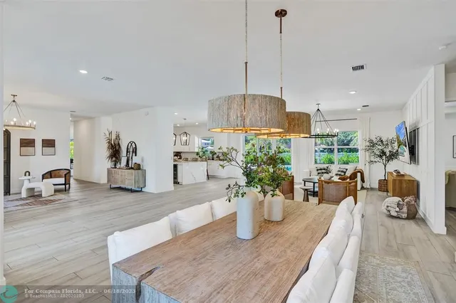 a view of a living room and dining room