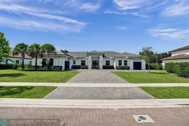 a view of house with a yard