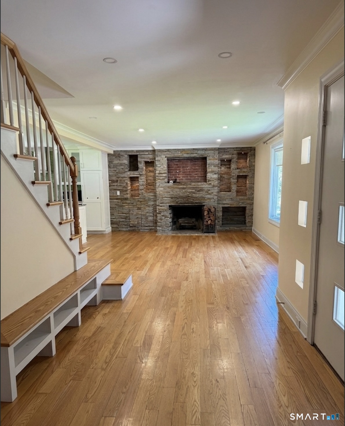 2182 North Benson Road Fairfield, CT 06824 - Photo 8 of 21 a room with wooden floor and furniture