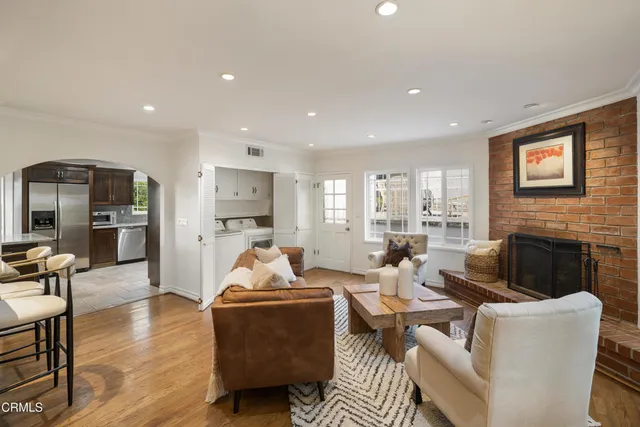 a spacious bedroom with a bed and ceiling fan