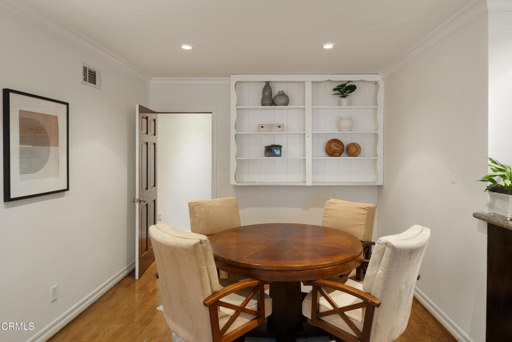 941 Chehalem Road La Canada Flintridge, CA 91011 - Photo 23 of 74 a view of a dining room with furniture and wooden floor