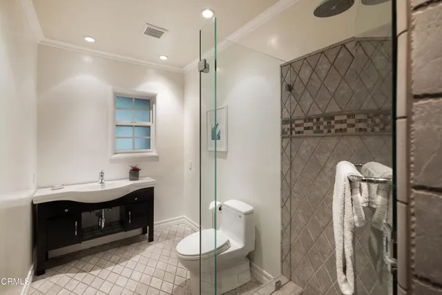 a bathroom with bathtub and window