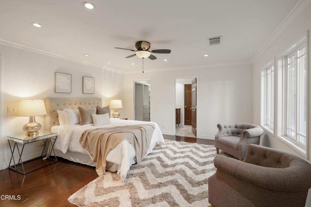 941 Chehalem Road La Canada Flintridge, CA 91011 - Photo 30 of 74 a spacious bedroom with a bed and ceiling fan