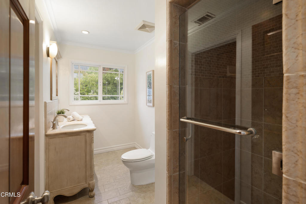 941 Chehalem Road La Canada Flintridge, CA 91011 - Photo 41 of 74 a bathroom with a sink toilet and shower