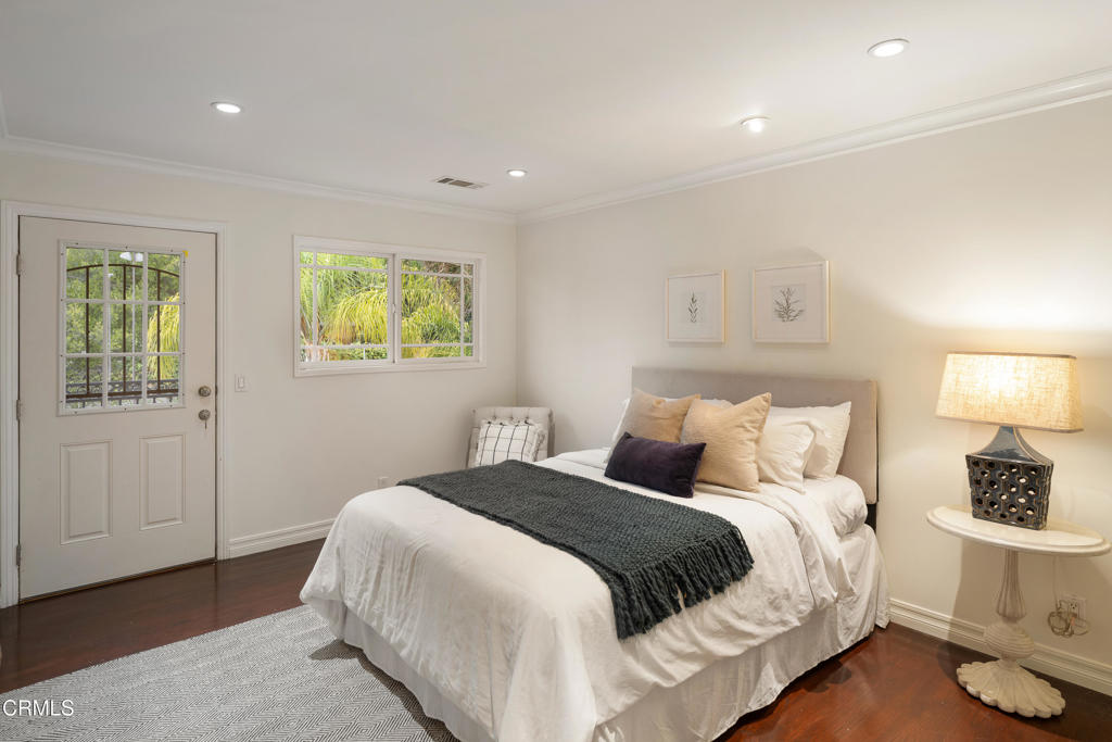 941 Chehalem Road La Canada Flintridge, CA 91011 - Photo 42 of 74 a bedroom with a bed and a night stand