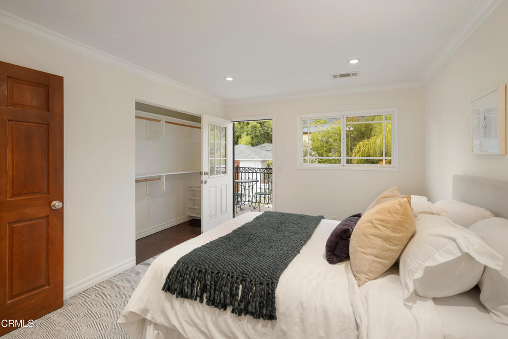 941 Chehalem Road La Canada Flintridge, CA 91011 - Photo 43 of 74 a bedroom with a bed and a refrigerator