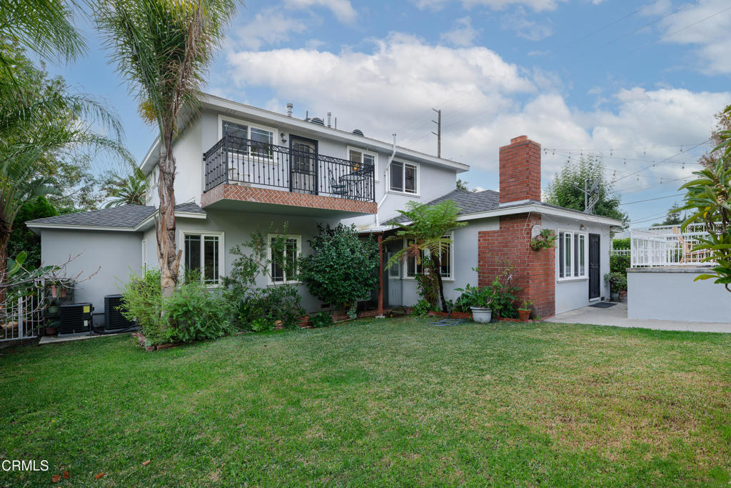 941 Chehalem Road La Canada Flintridge, CA 91011 - Photo 47 of 74 a front view of a house with a yard and trees