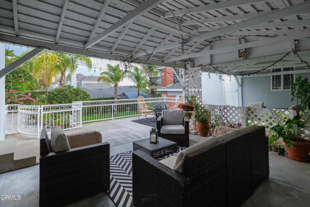 941 Chehalem Road La Canada Flintridge, CA 91011 - Photo 51 of 74 a view of a patio with couches chairs and a potted plant