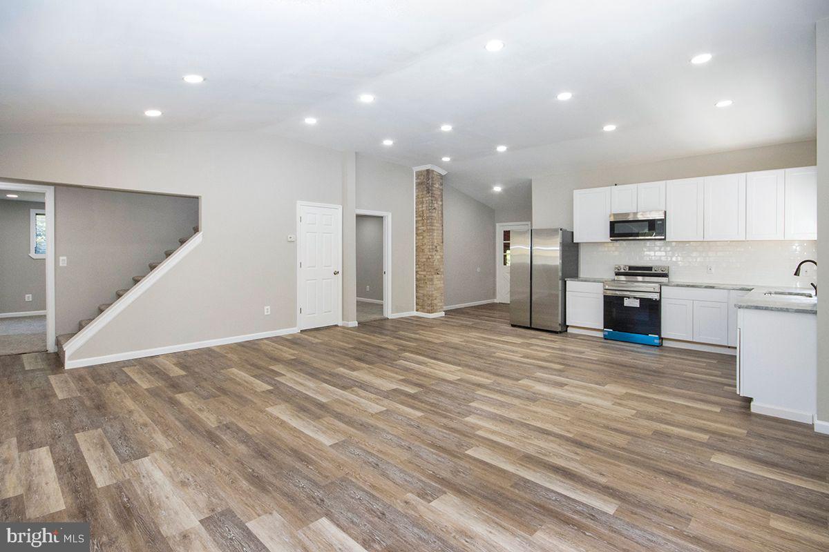 42 Smith Terrace Clementon, NJ 08021 - Photo 12 of 27 Great Room: Laminate Flooring, recessed lighting