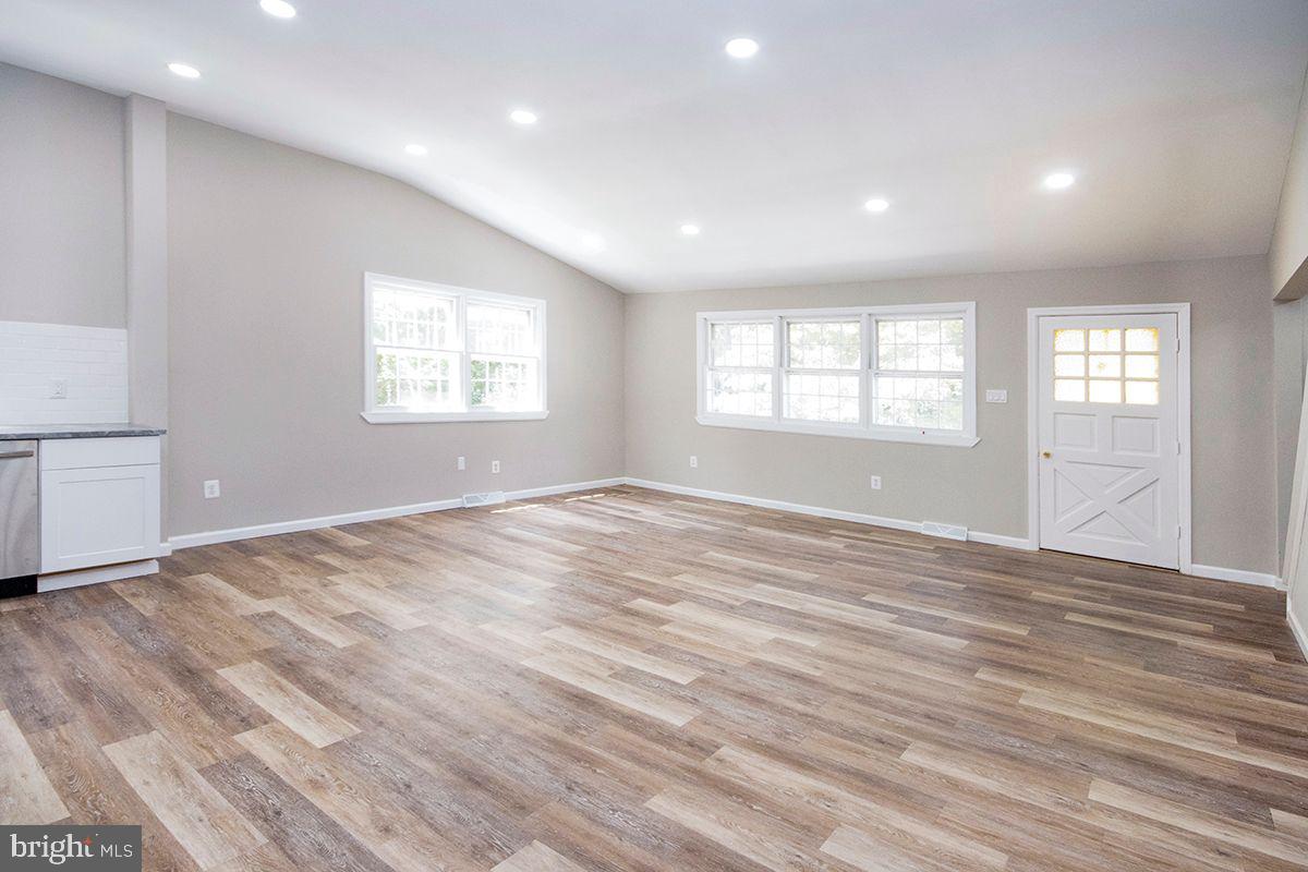 42 Smith Terrace Clementon, NJ 08021 - Photo 13 of 27 Great Room: Laminate Flooring, recessed lighting