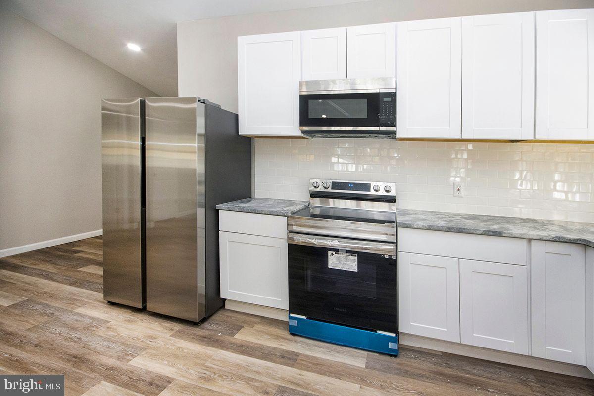 42 Smith Terrace Clementon, NJ 08021 - Photo 6 of 27 New Kitchen: Granite and Stainless Steel