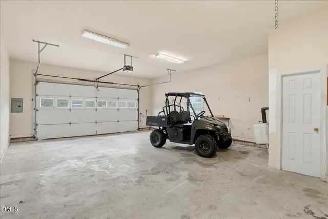 a view of a empty room with windows