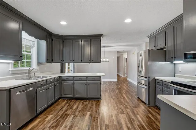 a bathroom with double vanity sink and a mirror