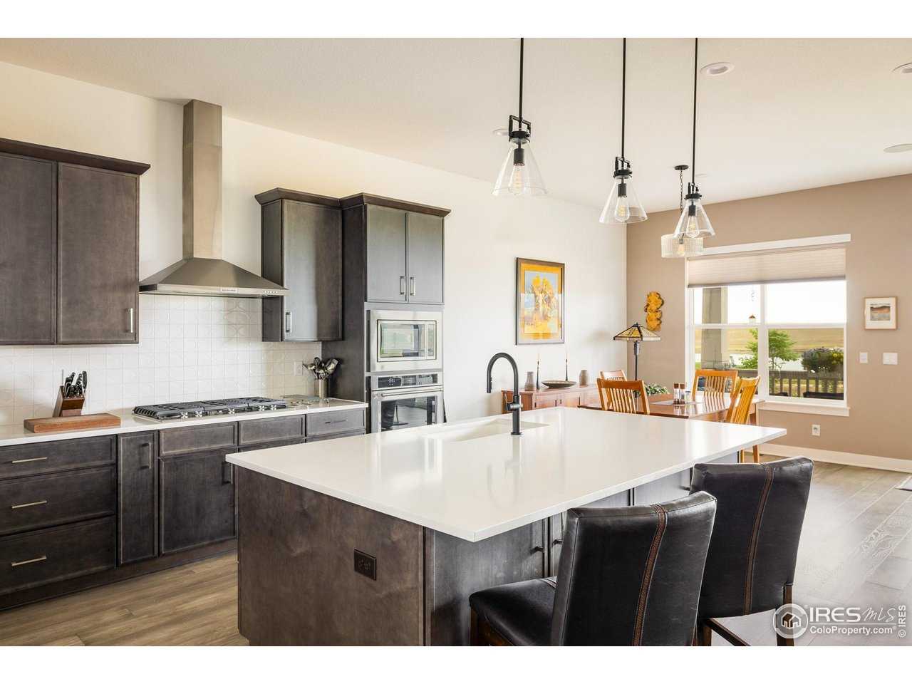 2940 Newfound Lk Road Berthoud, CO 80513 - Photo 13 of 42 a kitchen with stainless steel appliances a sink stove and refrigerator