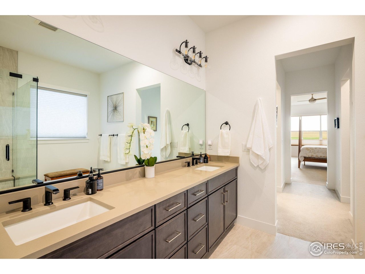 2940 Newfound Lk Road Berthoud, CO 80513 - Photo 18 of 42 a bathroom with a sink double vanity