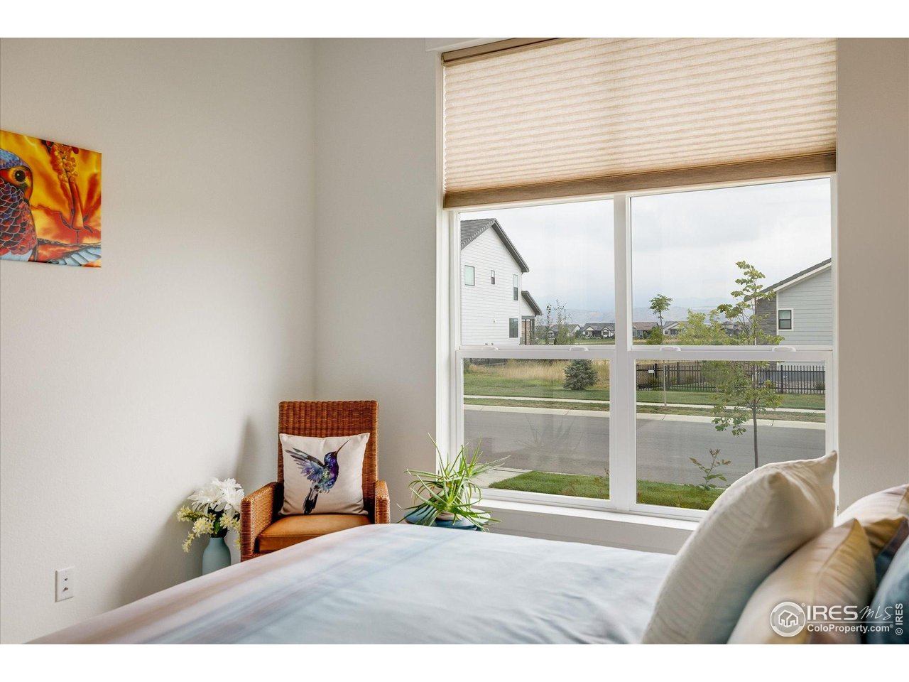 2940 Newfound Lk Road Berthoud, CO 80513 - Photo 20 of 42 a bedroom with furniture and a large window