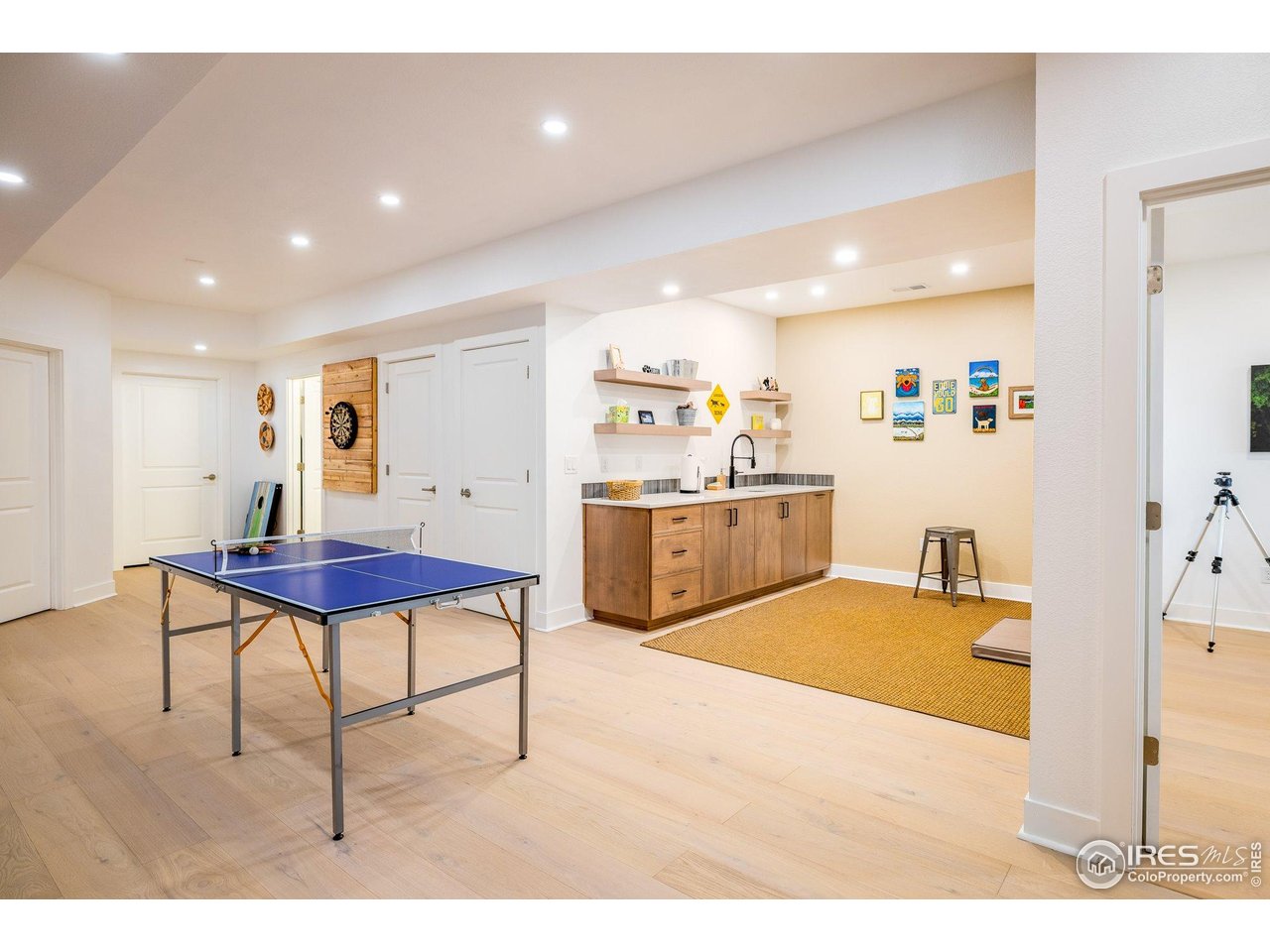 2940 Newfound Lk Road Berthoud, CO 80513 - Photo 25 of 42 a kitchen with stainless steel appliances kitchen island granite countertop a sink and a refrigerator