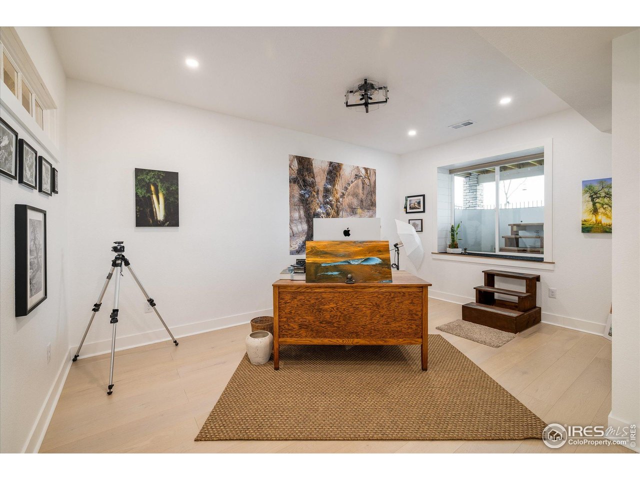 2940 Newfound Lk Road Berthoud, CO 80513 - Photo 30 of 42 a living room with furniture and a flat screen tv