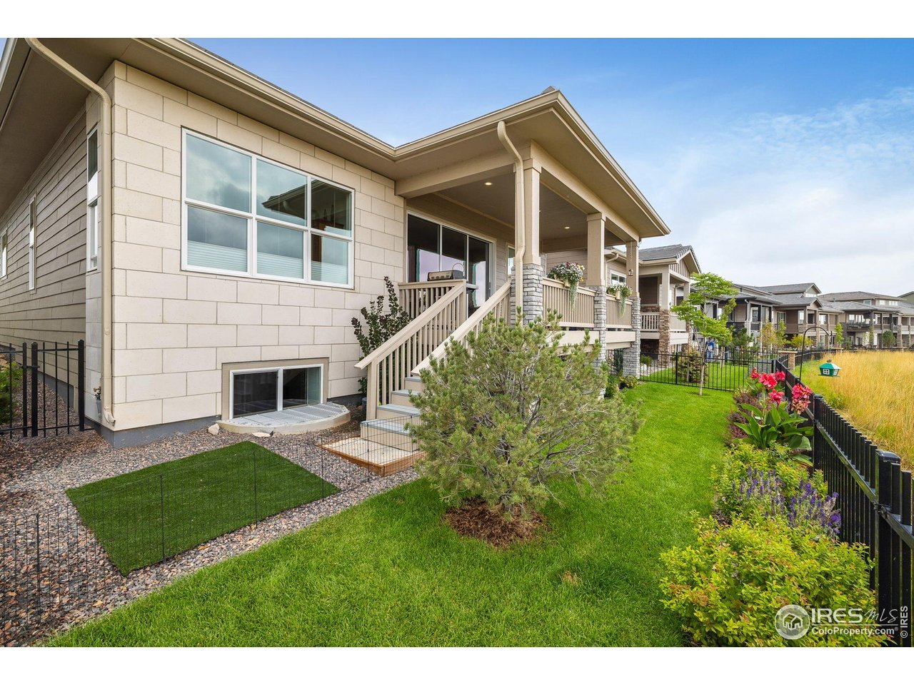 2940 Newfound Lk Road Berthoud, CO 80513 - Photo 34 of 42 a front view of a house with a yard