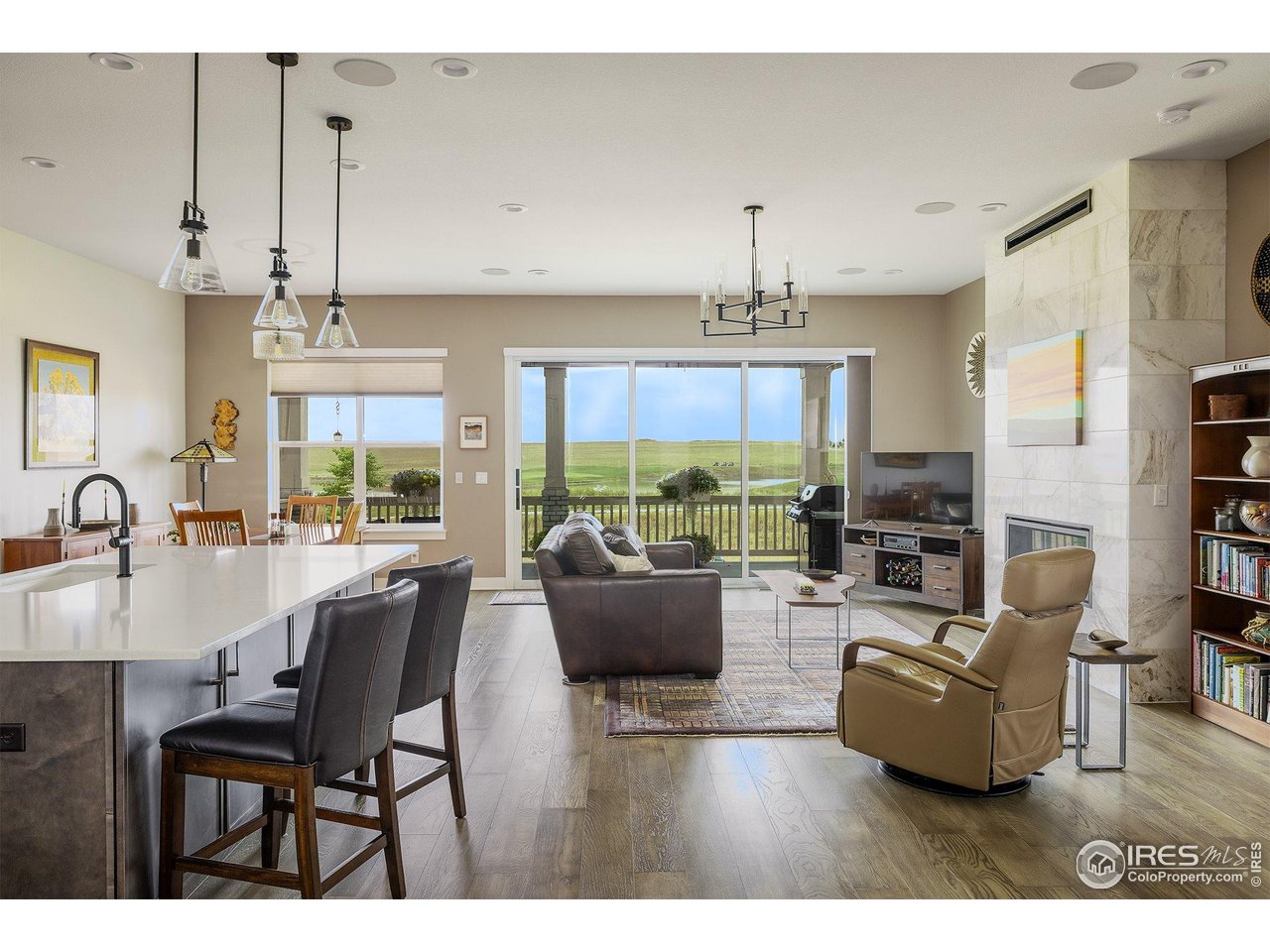 2940 Newfound Lk Road Berthoud, CO 80513 - Photo 5 of 42 a dining room with furniture a chandelier and window