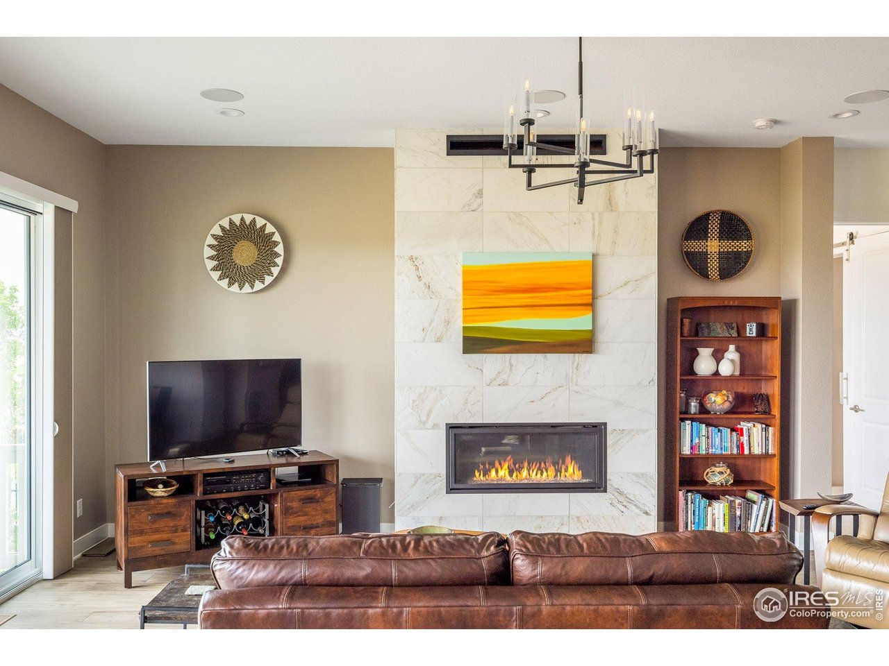 2940 Newfound Lk Road Berthoud, CO 80513 - Photo 6 of 42 a living room with furniture and a flat screen tv