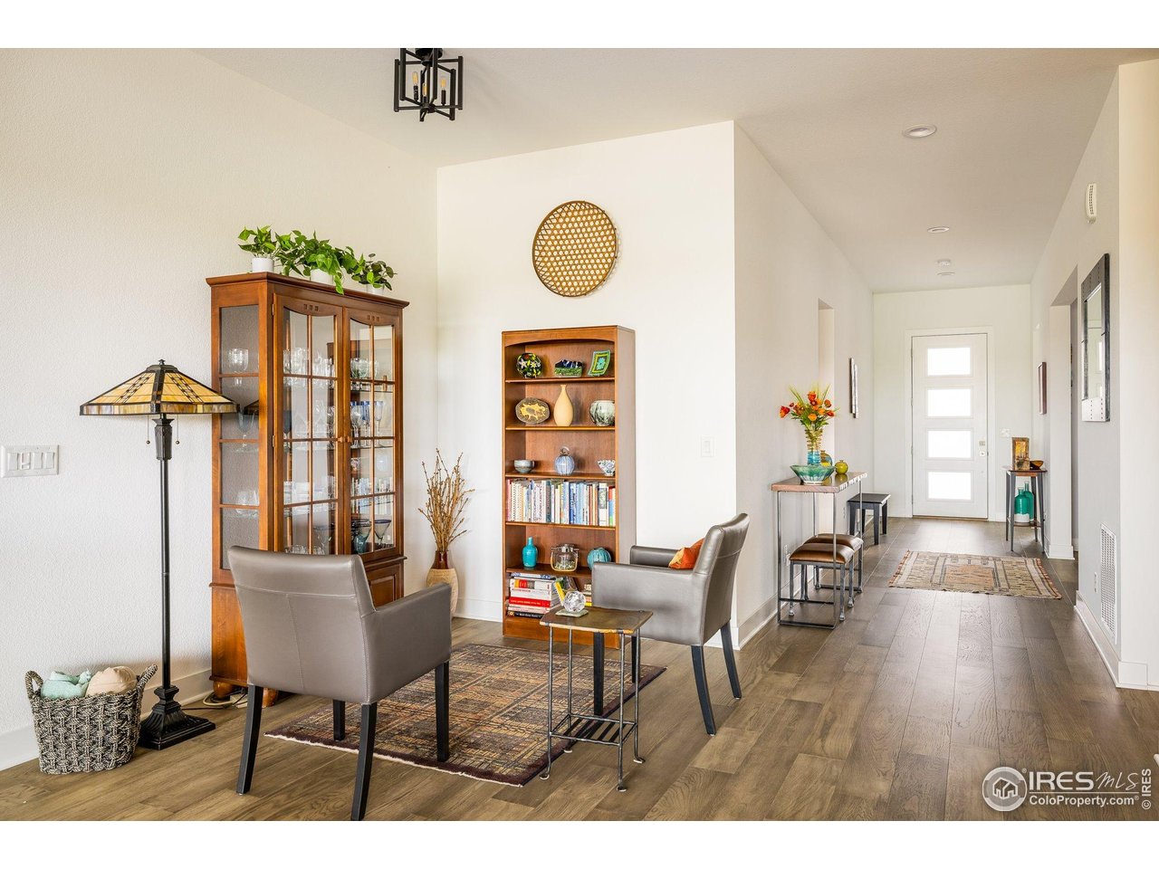 2940 Newfound Lk Road Berthoud, CO 80513 - Photo 10 of 42 a living room with furniture and wooden floor