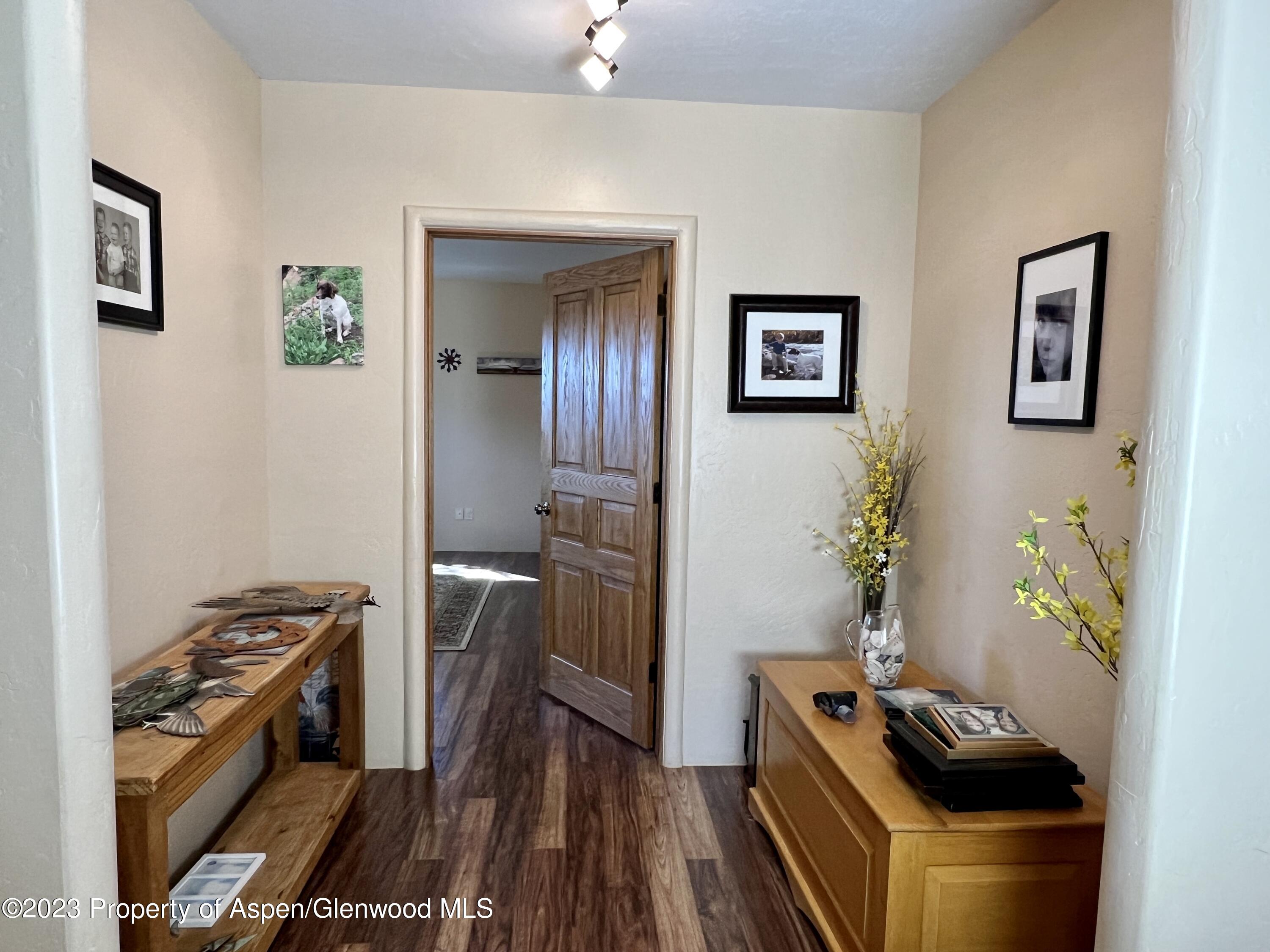 1007 Mesa Drive Rifle, CO 81650 - Photo 16 of 27 a room with furniture and flat screen tv