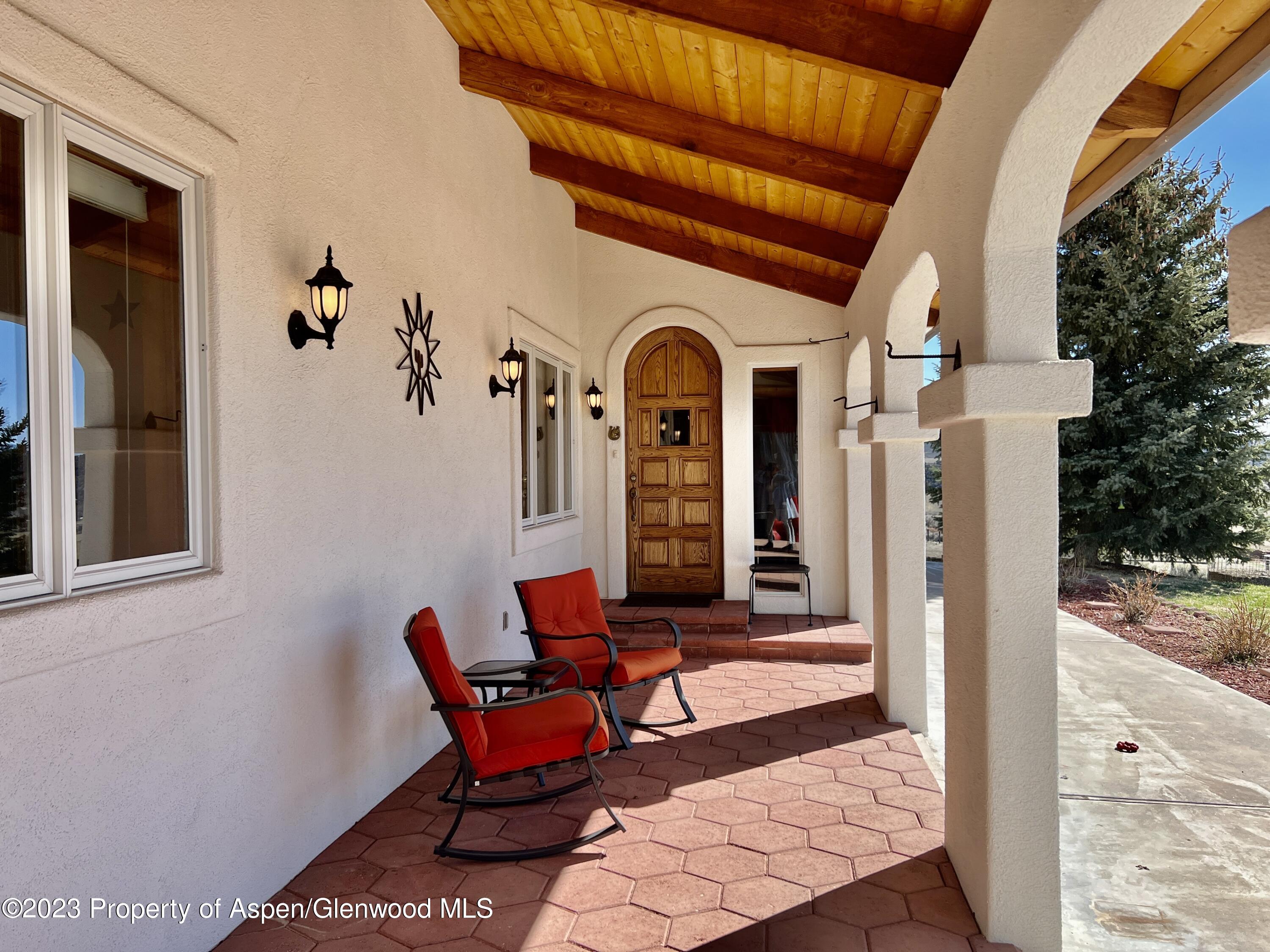 1007 Mesa Drive Rifle, CO 81650 - Photo 2 of 27 a front view of a house with outdoor seating