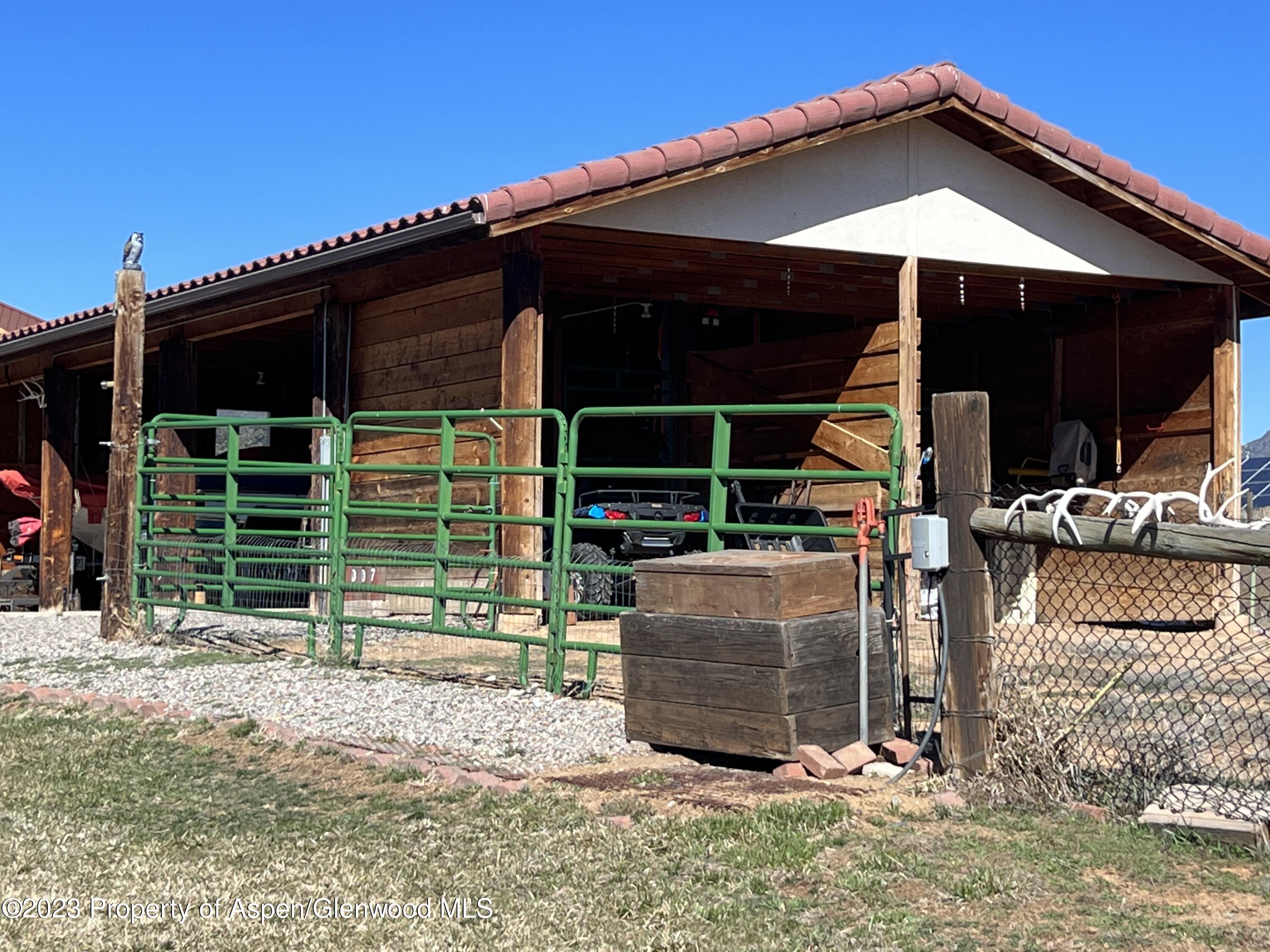 1007 Mesa Drive Rifle, CO 81650 - Photo 24 of 27 a view of a house with a porch