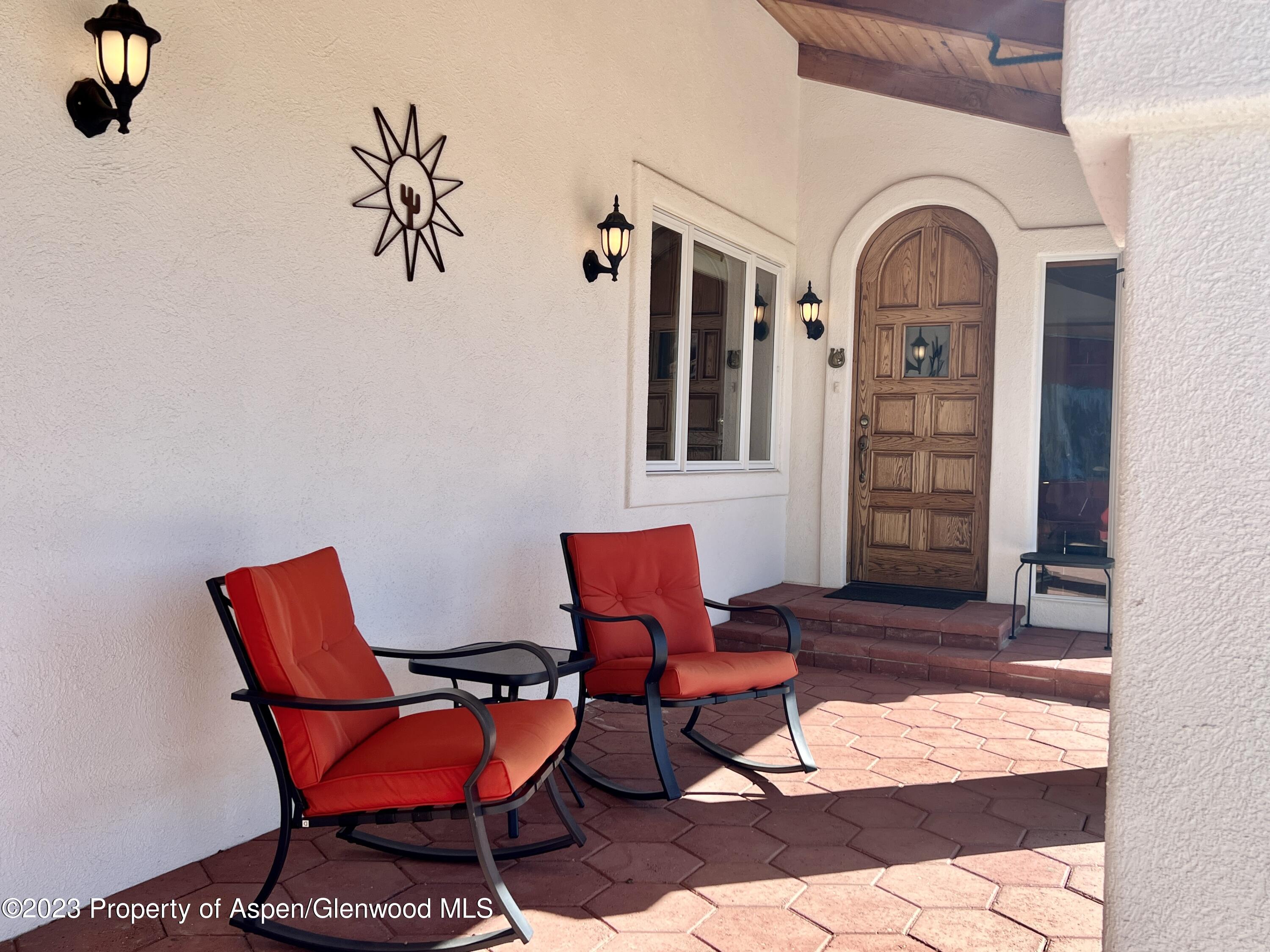 1007 Mesa Drive Rifle, CO 81650 - Photo 4 of 27 a outdoor view of a house with outdoor seating