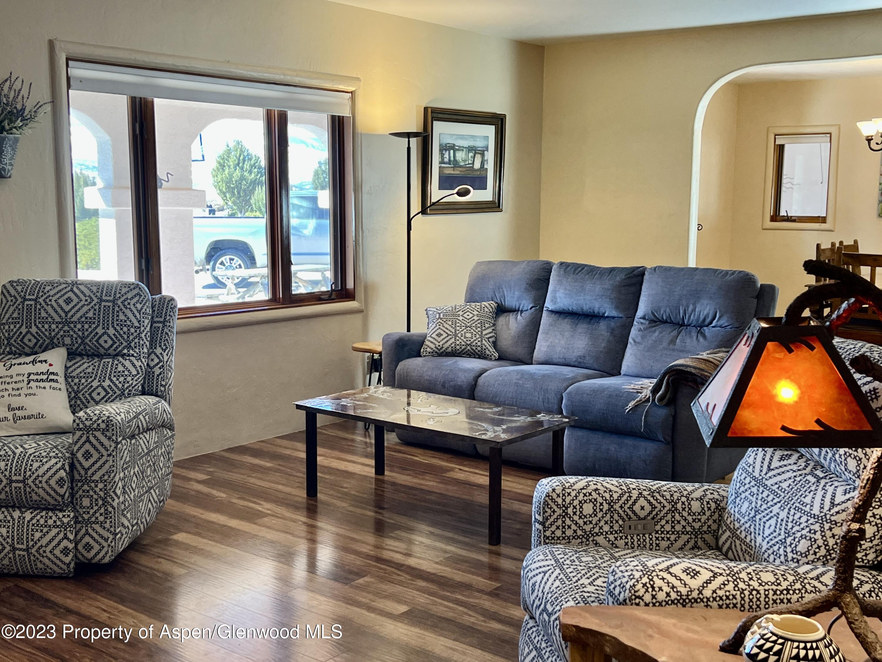1007 Mesa Drive Rifle, CO 81650 - Photo 10 of 27 a living room with furniture and a window