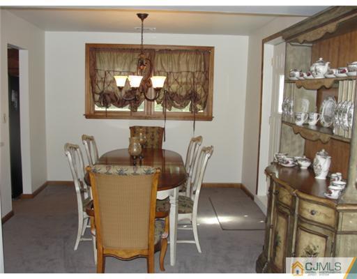 6 Harmon Road Edison, NJ 08837 - Photo 8 of 19 a dining room with furniture and window