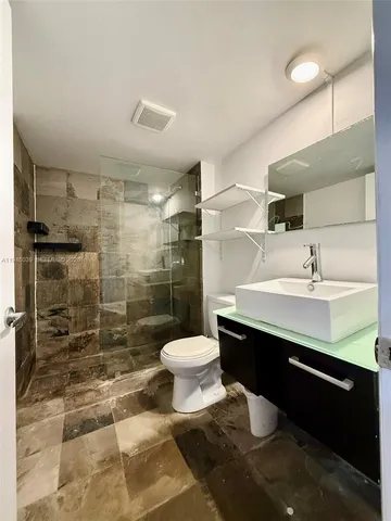 a bathroom with a sink and a toilet