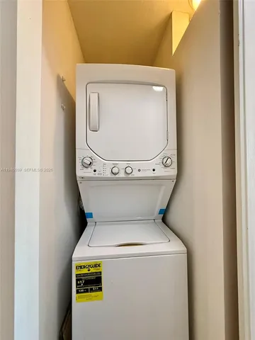 a bathroom with a toilet a sink and bathtub