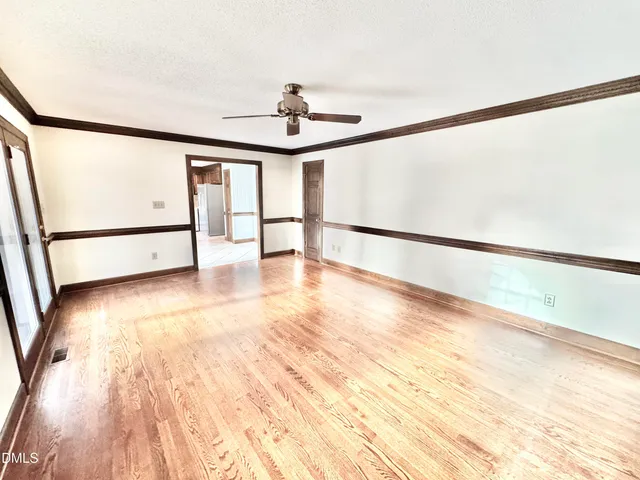a view of a room with a hallway