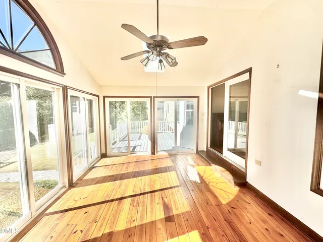 an empty room with windows