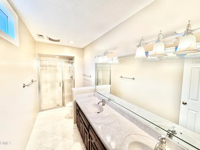 a view of a swimming pool with a yard