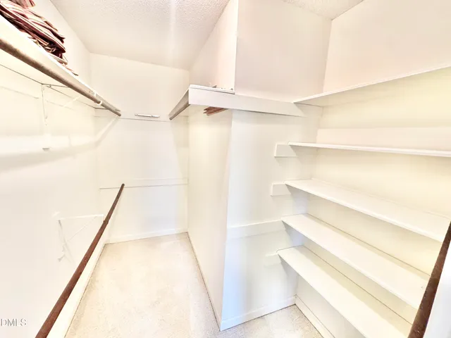 a view of a house with backyard and porch